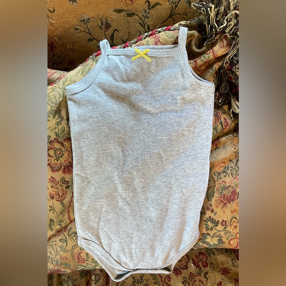 Hudson baby onesie with yellow bow